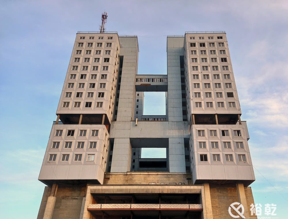 brown concrete building under blue sky during dayti (2).jpg