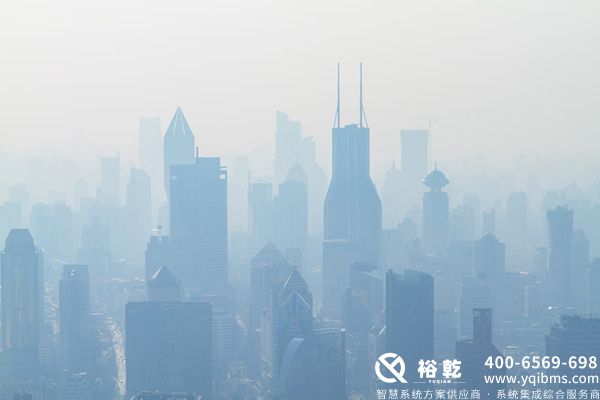 aerial view of high-rise buildings covered with smo.jpg