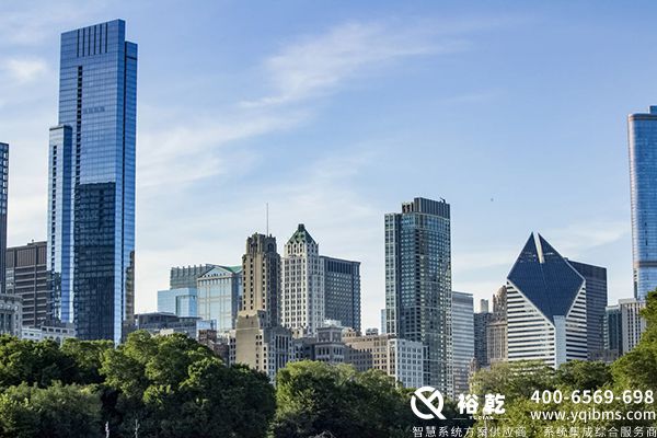 gray high-rise buildings near trees.jpg