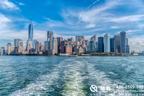 city skyline across body of water under blue_yythkg.jpg